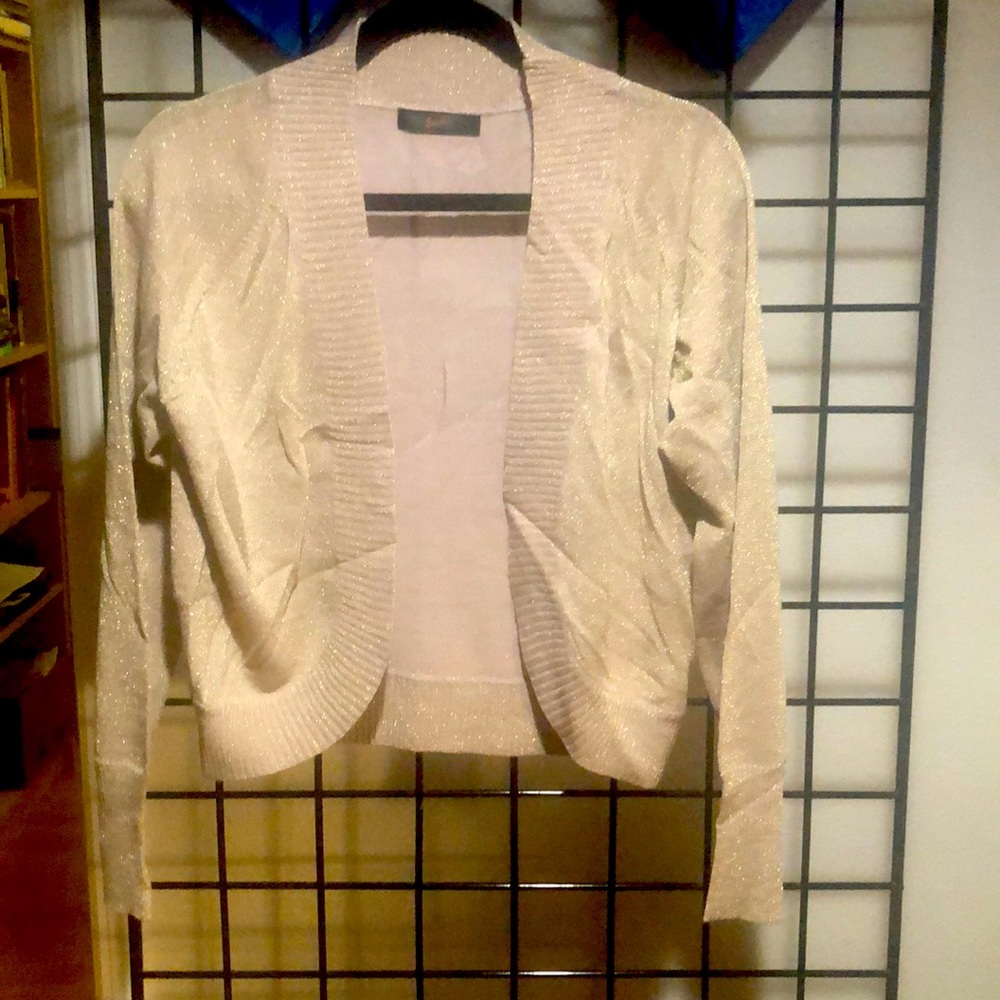 Beautiful handmade cardigan with Gold yarn